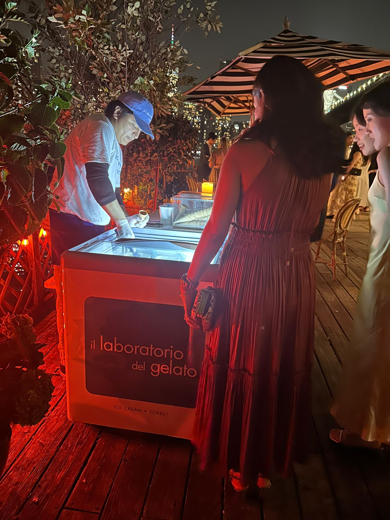 Wedding guests selecting gelato and ice cream from the cart