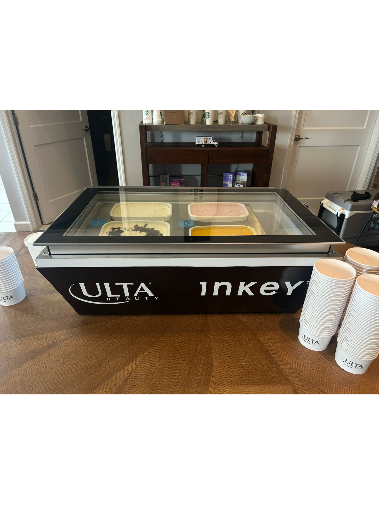 Branded gelato cart with custom front panel and matching cups at a corporate event, il laboratorio del gelato